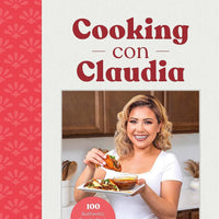 a cookbook with a woman holding a plate of food